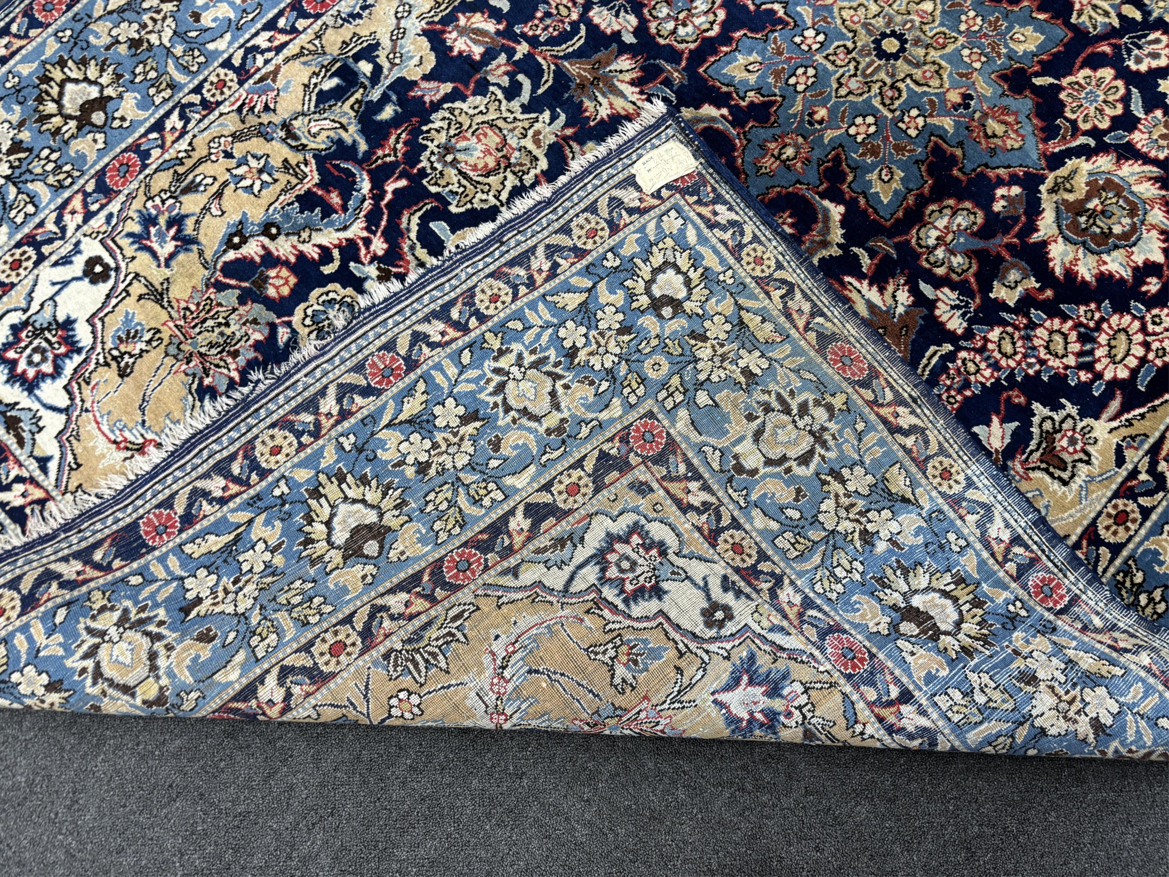 A North West Persian blue ground carpet, 270 x 158cm